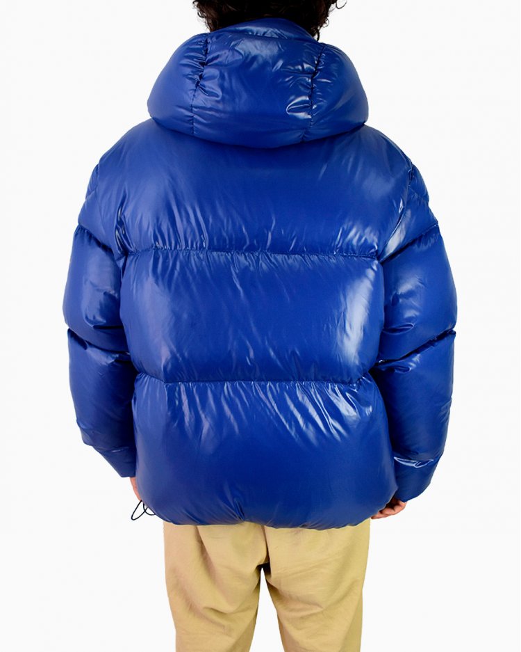 Jaqueta Moncler original matelassê com patch de logo azul feminina